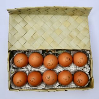 Palmleaf box with eggscellent eggs